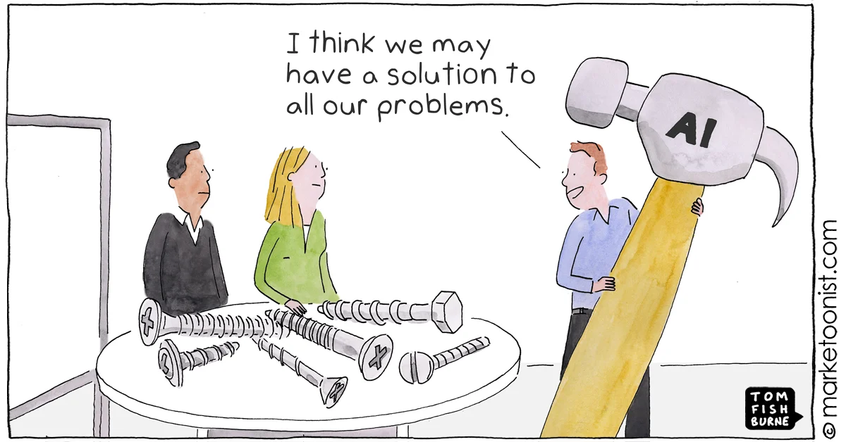 Cartoon showing two persons at a table full of oversized screws and a man saying 'I think we may have a solution to ALL our problems' while holding an oversized hammer labeled 'AI'.